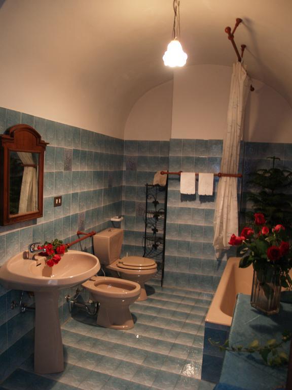 Bed and Breakfast Le Petit Chateau Дольчеаккуа Номер фото